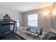 Bright exercise room complete with hardwood floors, treadmill, and pilates machine at 6817 S Gabrielle St, Tampa, FL 33611