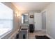 This exercise room offers natural light, a floor lamp, and essential fitness equipment at 6817 S Gabrielle St, Tampa, FL 33611