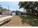 Inviting home with a driveway, garage, and well-manicured front lawn offering a picturesque setting at 6817 S Gabrielle St, Tampa, FL 33611