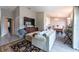 Spacious living room offering hardwood floors and an open layout into the dining and kitchen areas at 6817 S Gabrielle St, Tampa, FL 33611