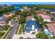 Stunning aerial view of the beautiful neighborhood showcasing lush landscaping and a gorgeous waterfront at 7114 Pelican Island Dr, Tampa, FL 33634