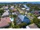 Beautiful aerial view of neighborhood showcasing mature landscaping and waterway access at 7114 Pelican Island Dr, Tampa, FL 33634