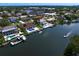 Waterfront home with a private dock, boats, and a sparkling pool, ideal for relaxation and entertainment at 7114 Pelican Island Dr, Tampa, FL 33634