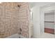 Tiled shower and bathtub combination in the bathroom at 7114 Pelican Island Dr, Tampa, FL 33634