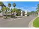 Elegant community entrance featuring ornate gates and meticulously landscaped surroundings for a grand welcome at 7114 Pelican Island Dr, Tampa, FL 33634