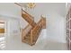 Bright foyer with staircase, chandelier, and a view of the front door at 7114 Pelican Island Dr, Tampa, FL 33634