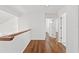Hardwood floors in an upstairs hallway at 7114 Pelican Island Dr, Tampa, FL 33634