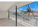 Covered outdoor patio featuring durable tile floors and views of the surrounding landscape at 7114 Pelican Island Dr, Tampa, FL 33634