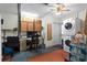 This basement area includes laundry and workspace, featuring a washer and dryer at 7276 21St Street N, St Petersburg, FL 33702