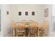 Charming dining area with seating for six and natural light at 7276 21St Street N, St Petersburg, FL 33702