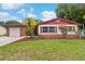 Charming single-story home with a well-manicured lawn and attached garage at 7276 21St Street N, St Petersburg, FL 33702
