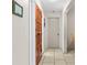 Bright hallway featuring neutral walls and tile flooring at 7276 21St Street N, St Petersburg, FL 33702