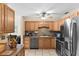 Modern kitchen with stainless steel appliances and ample countertop space at 7276 21St Street N, St Petersburg, FL 33702