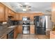 Well-equipped kitchen featuring stainless steel appliances and light wood cabinets at 7276 21St Street N, St Petersburg, FL 33702