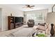 Comfortable living room with tile flooring, natural light and neutral colors throughout at 7276 21St Street N, St Petersburg, FL 33702