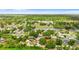 Aerial neighborhood view shows convenient access to a school nearby with a pinpoint on the home at 7276 21St Street N, St Petersburg, FL 33702