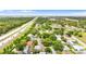 The aerial view shows a home pinpointed in the neighborhood near the highway at 7276 21St Street N, St Petersburg, FL 33702