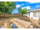 A spacious back yard with a custom picnic table offering lots of space for entertaining at 7804 Bracken Dr, Port Richey, FL 34668