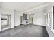 Large living room with vaulted ceiling and fireplace at 7930 Jeffery Ave, North Port, FL 34287
