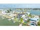 Stunning waterfront homes with private docks and pools, showcasing luxurious coastal living at 820 Bay Point Dr, Madeira Beach, FL 33708