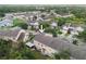 An overhead view of a multi-Gathering property showcasing its proximity to the surrounding neighborhood at 9616 Carlsdale Dr, Riverview, FL 33578