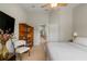 Bedroom featuring neutral walls, carpet flooring, fan and built-in shelves for storage at 9616 Carlsdale Dr, Riverview, FL 33578