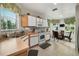 Charming kitchen with ample natural light, cozy breakfast nook and white appliances at 9616 Carlsdale Dr, Riverview, FL 33578