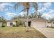 Charming single-story home featuring a two-car garage and well-maintained landscaping in a quiet neighborhood at 2816 Soprano Ln, North Port, FL 34286