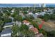 Aerial view showcasing the property's location near the water and surrounding neighborhood at 3118 W Bay Villa Ave, Tampa, FL 33611