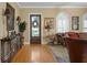 Elegant living room featuring hardwood floors, decorative lighting, and a stylish entryway at 3118 W Bay Villa Ave, Tampa, FL 33611