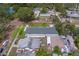 An aerial view of a well-maintained neighborhood showcasing the property's location and surrounding greenery at 102 7Th Se Ave, Largo, FL 33771