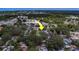 Overhead image highlighting a home in a neighborhood setting, lush surroundings with a yellow arrow marking the spot at 102 7Th Se Ave, Largo, FL 33771