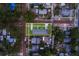 Aerial view highlighting the property's location, landscaping, and neighborhood charm at 102 7Th Se Ave, Largo, FL 33771