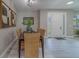 Dining room with seating for four flows from entryway, next to front door at 102 7Th Se Ave, Largo, FL 33771