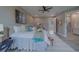 Serene main bedroom features soft colors, decorative pillows, and an en-suite bathroom at 102 7Th Se Ave, Largo, FL 33771