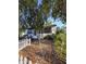 Charming home with a picket fence and landscaping in the front yard at 1107 Grant St, Clearwater, FL 33755