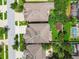 Aerial view of home with fenced yard and outdoor pergola at 11407 Drifting Leaf Dr, Riverview, FL 33579