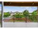 Balcony has views of a backyard, a lawn with a pergola, and mature trees at 11407 Drifting Leaf Dr, Riverview, FL 33579