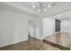 Open living room with wood floors and modern recessed lighting at 1311 W Perdiz St, Tampa, FL 33612