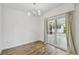 Bright sunroom with tile floors, modern lighting, and seamless access to outdoor spaces at 1311 W Perdiz St, Tampa, FL 33612