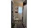 Bright bathroom with shower and decorative bull artwork at 13330 Fort King Rd, Dade City, FL 33525