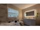 Bathroom featuring a jacuzzi tub and well lit mirror at 13330 Fort King Rd, Dade City, FL 33525