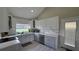 Spacious kitchen features sleek appliances and ample counter space at 13330 Fort King Rd, Dade City, FL 33525