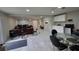 Open living area with dining set and kitchenette, great for flexible living at 13330 Fort King Rd, Dade City, FL 33525