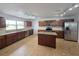 Beautiful kitchen featuring stainless steel appliances, granite countertops, and a central island at 13551 Banner Rd, Spring Hill, FL 34609