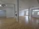 Beautiful open concept living space with modern lighting and tile floors at 13551 Banner Rd, Spring Hill, FL 34609
