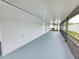 Enclosed patio with ceiling fans at 13551 Banner Rd, Spring Hill, FL 34609