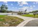 Charming single-story home with manicured lawn and attached two-car garage at 1410 Moss Laden Ct, Brandon, FL 33511