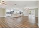 Spacious kitchen and open living area with stainless steel appliances and a large central island at 1410 Moss Laden Ct, Brandon, FL 33511