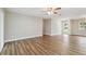 Spacious living room with wood-look floors and neutral paint at 1410 Moss Laden Ct, Brandon, FL 33511